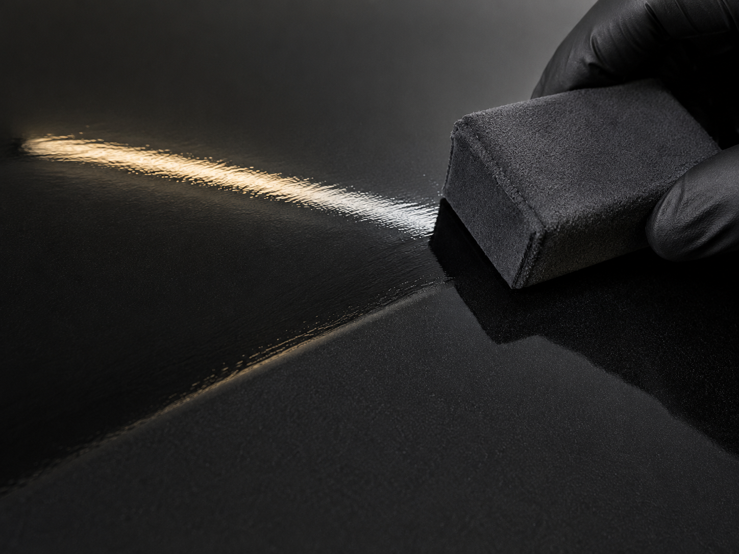 Water beading on a freshly coated hood